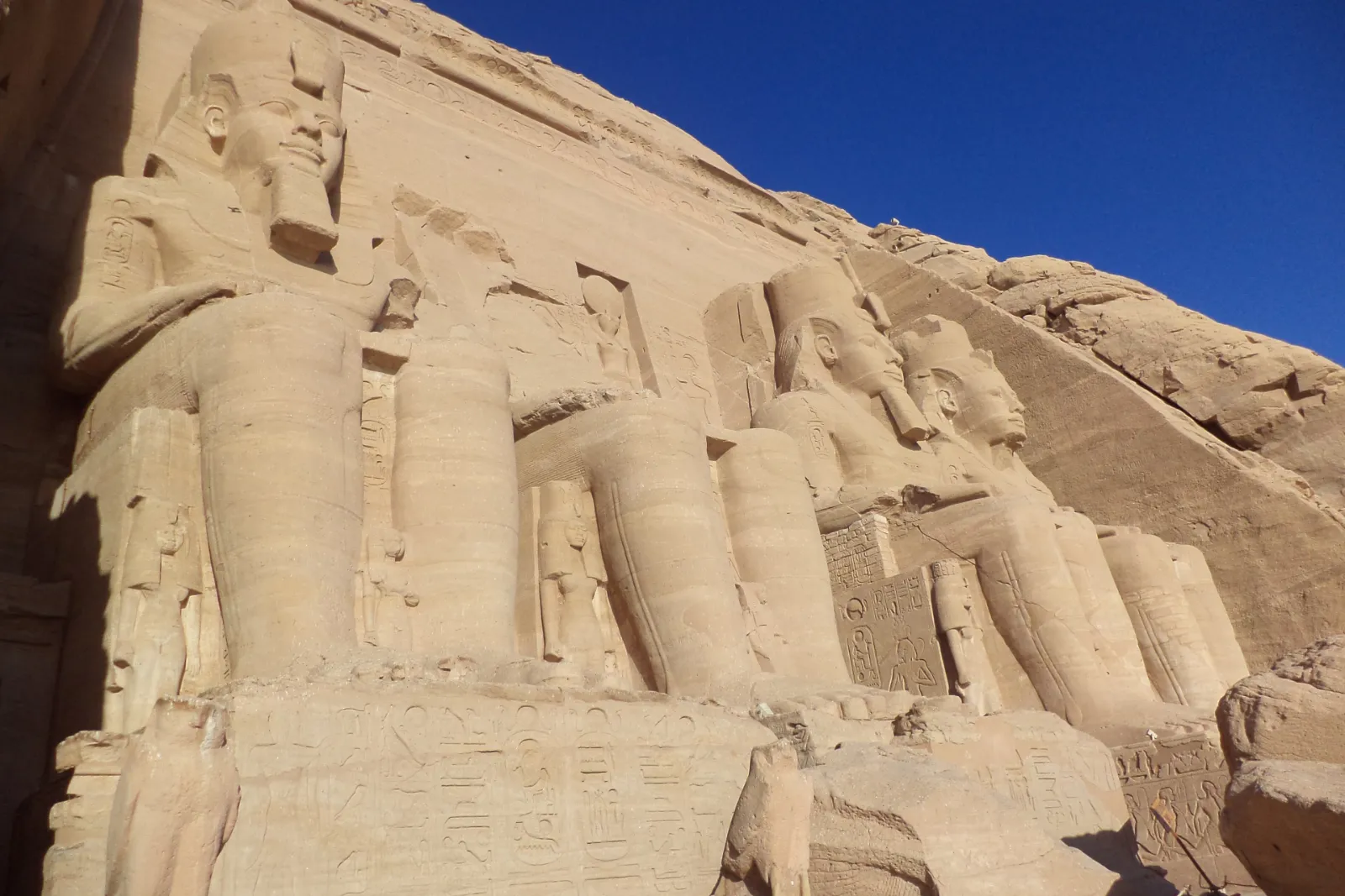 Colossal seated statues of Ramesses II at the entrance of Abu Simbel temple