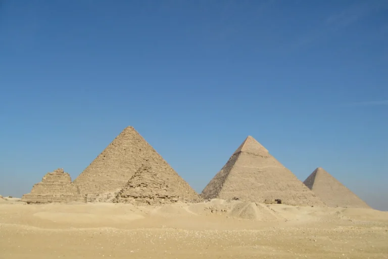 Pyramids of Giza on the plateau under a clear sky
