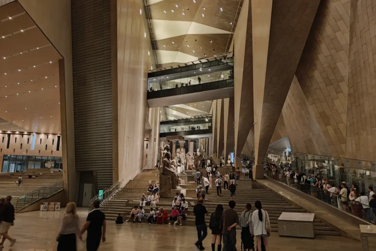 Atrium of the Grand Egyptian Museum with a colossal statue of Ramesses II
